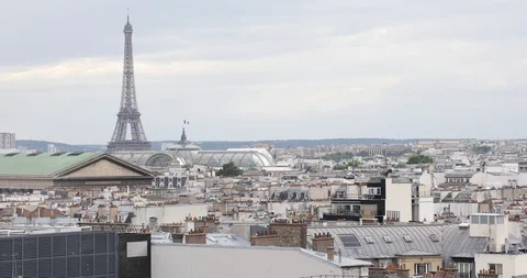 Paris rooftops view and Eiffel Tower in a cloudy day in France Stock Footage 124584259