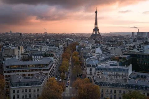 Paris scene at sunset with Eiffel Tower and colorful sky Stock-Fotos