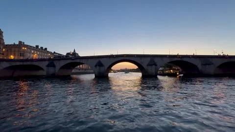 Paris Seine Bridge at Sunset Over River With Historic Stone Arches and Even.. Stock Footage 336141293