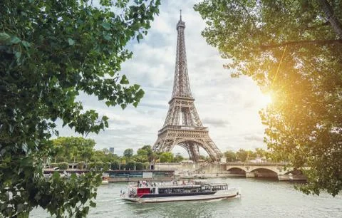 Paris Seine view with Eiffel tower and ship at summer Stock Photos