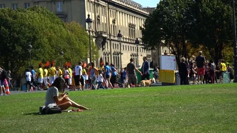 PARIS - SEPTEMBER 7, 2017: Big crowd are running the marathon in the city road Stock Footage 105212088