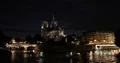 Paris Skyline People Walk Notre Dame Cathedral Landmark Tour Boat on River Night 4k or 4k+ Resolution