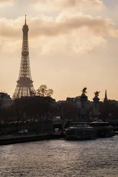 Paris at sunset with the Eiffel Tower and the bridge Alexander III The cit... Stock Photos