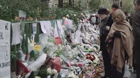 Paris terror attacks - Shrine in front of Bataclan Stock Footage 57246401