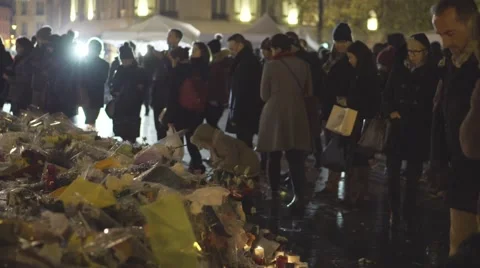 Paris terror attacks - Shrine at night, place de la République Stock Footage 57339662