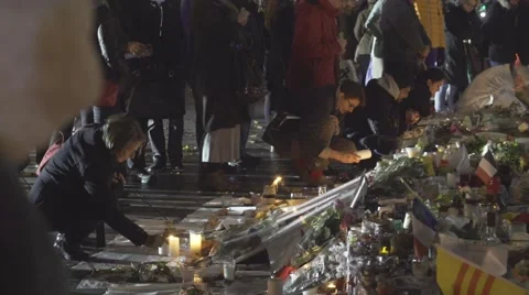 Paris terror attacks - Shrine place de la République at night Stock Footage 57338768