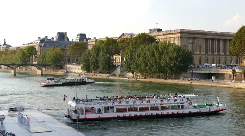 Paris. Tour boats turning on the River Seine. Stock Footage