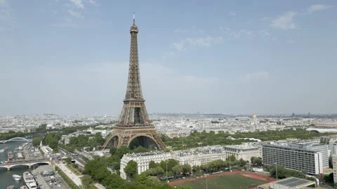 The Paris Tour Eiffel or Eiffel Tower with Pont Bir-Hakeim Bridge and Seine Stock Footage 201338919