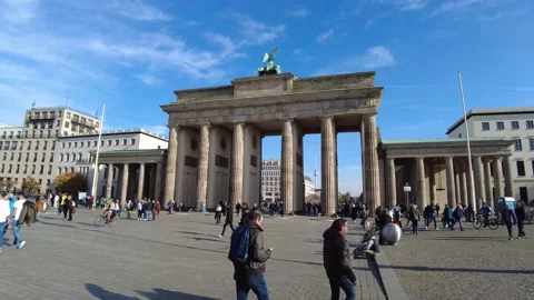 Pariser Platz Brandenburg Gate long shot tourists day blue sky 4K Stock Footage 173099276