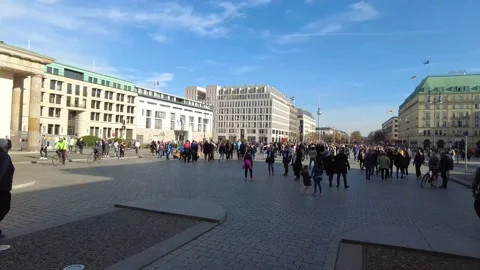 Pariser Platz Brandenburg Gate long shot pan tourists day blue sky 4K Stock Footage 173099787