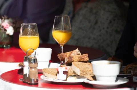 Parisian breakfast featuring buttery, flaky croissant paired with aromatic .. Stock Photos