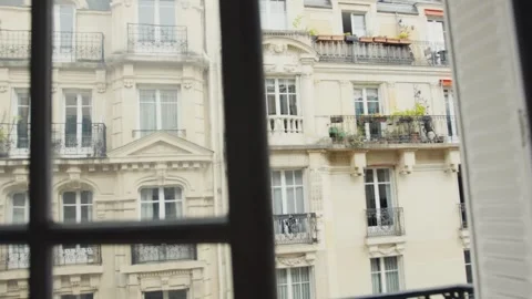Parisian building seen through window with shutters Stock Footage 307601894