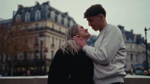 Parisian Romance Concept Super 8 Film Style Couple In Love Embracing During City Stock Footage 330094184