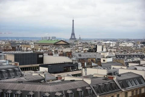 Parisian rooftops with Eiffel Tower and Grand Palais in the distance Stock Photos