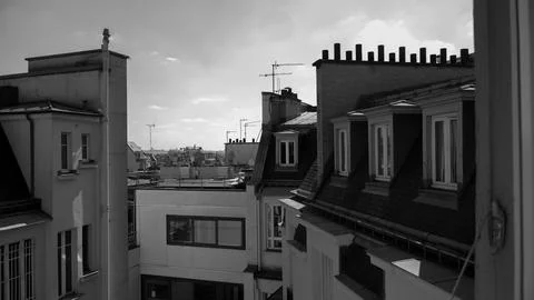 Parisian Rooftops View Through an Open Window B&amp;W Stock-Fotos