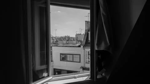 Parisian Rooftops View Through an Open Window B&amp;W Stockfoto's