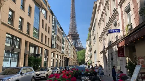 Parisian street with Eiffel tower in the background. Paris, France Stock Footage 276161858