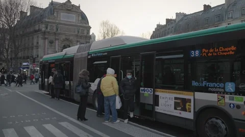 Parisians Taking Bus to Commute at Saint-Michel Paris, France Stock Footage 243403306