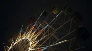 Park Attraction Ferris Wheel Carousel Swing Night Evening With Illuminated Light Stock Footage