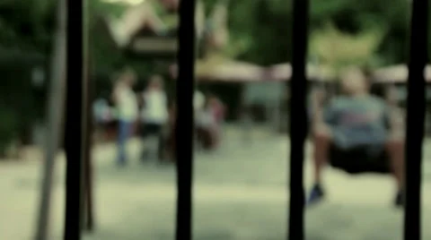Park behind bars 2 Stock Footage 30457601