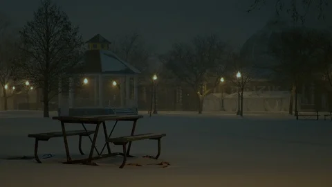 Park bench in the snow. Video stock 104018462