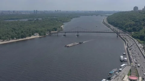 Park bridge and barge on the dnieper river Stock Footage 193780063