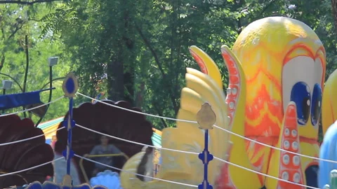 Park carousel in park Stock Footage 96351546