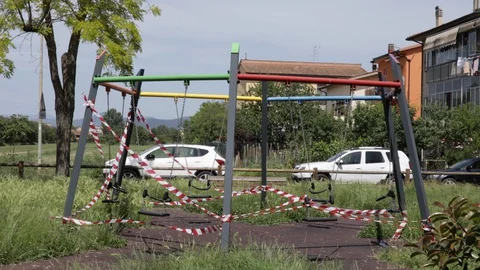 Park Closed With Warning Signal Red And White Ribbon Because Of Quarantine. Stock Footage 130064366