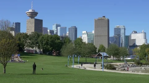 Park in downtown with cityscape at the background. 스톡 동영상 73914836