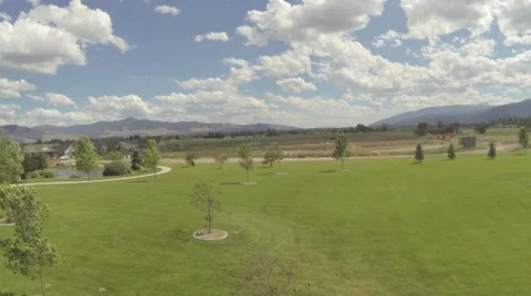 Park flight raw over grass Stock Footage 51365420