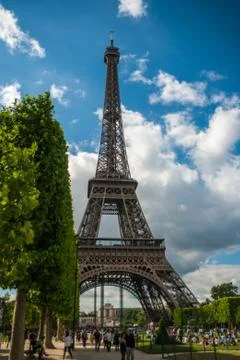 Park in front of Eiffel Tower Tour Eiffel blue sky clouds Stock Photos