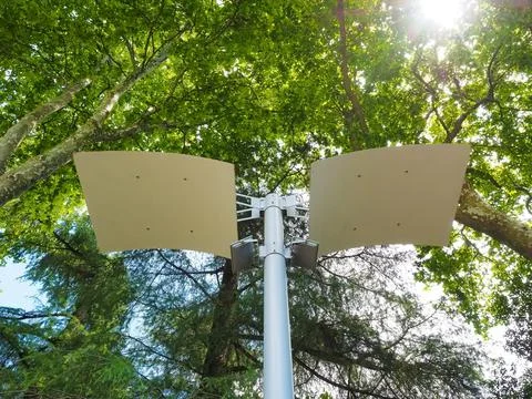 Park luminaire with two rectangular spotlights and reflectors against a Stock Photos