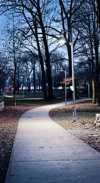 Park path at dusk Stock Photos
