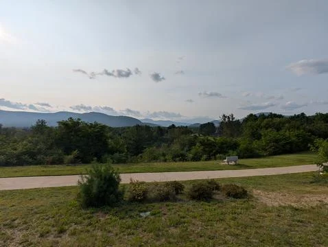 Park path with a scenic mountain view, New Hampshire, USA 写真素材