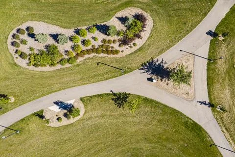 Park with a path that is split into three sections Stock Photos