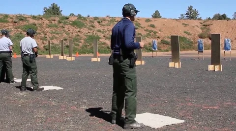 Park Rangers at shooting range Stock Footage 45594162