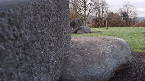 Park Sculpture Black Dog Stick In Mouth Stock Footage 263885953