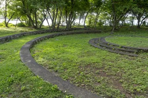 Park with a stone circle and steps Stock Photos