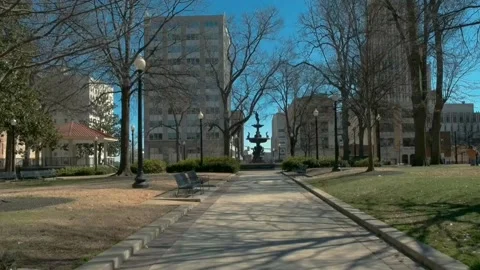 Park surrounded by dry trees in the middle Stock Footage 148968089