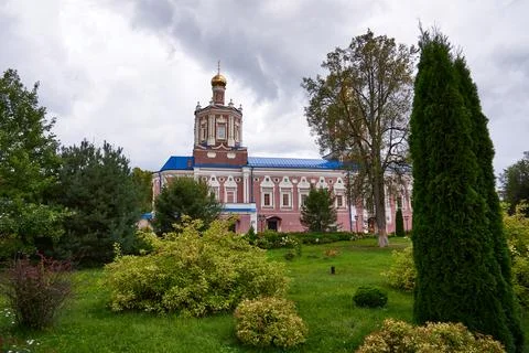 A park on the territory of the Solotchinsky Monastery on a cloudy summer evening Stock Photos