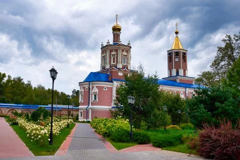 Park on the territory of the Solotchinsky Monastery on a cloudy summer day Stock Photos