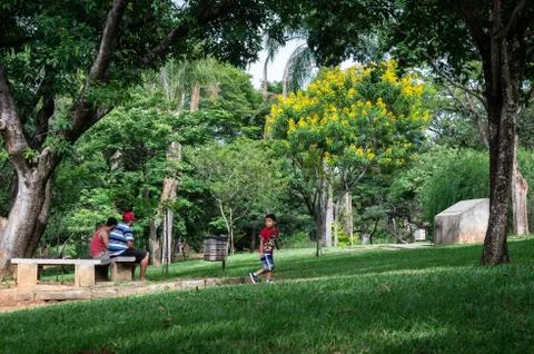 Park visitors enjoying the green areas of Belo Horizonte zoological garden Stock Photos