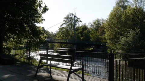 Parkbench at river Stock Footage 98149849