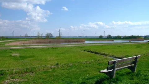 Parkbench with windmills Stock Footage 108657525