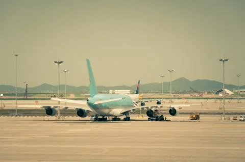 Parked airplane Stock Photos
