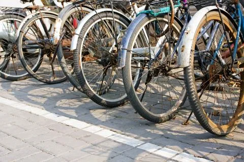 Parked bicycles Stock Photos