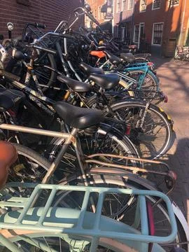 Parked bicycles Stock Photos
