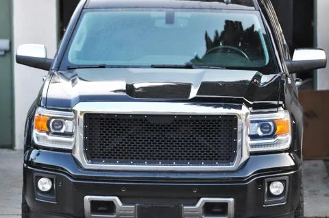 Parked black SUV Stock Photos