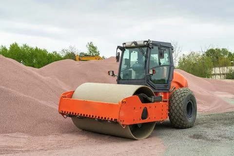 Parked drum roller at the construction site after work Stock Photos