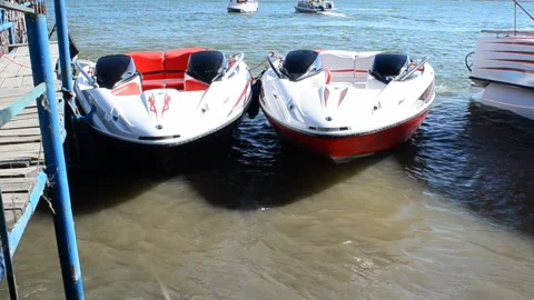 Parked electronic boats Stock Footage 156314954